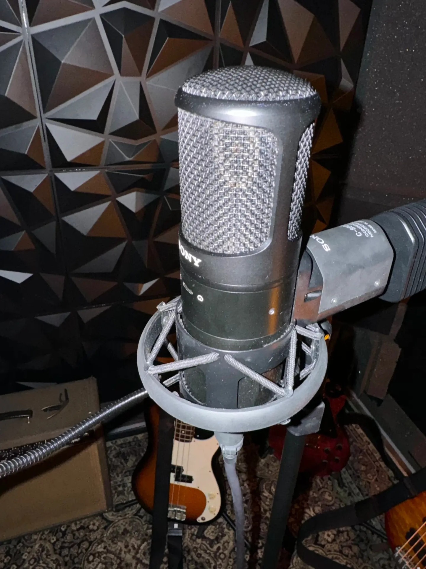 Live room with microphone and amps